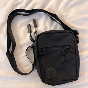 baboon to the moon Sling Bag in Black

New without tags